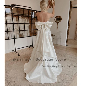 Lakshmigown Просто Атласное Сватбена рокля Трапецовидна форма от сатен 2022 Елегантни Сватбени Дълги Вечерни Рокли с Лък Раменете 2
