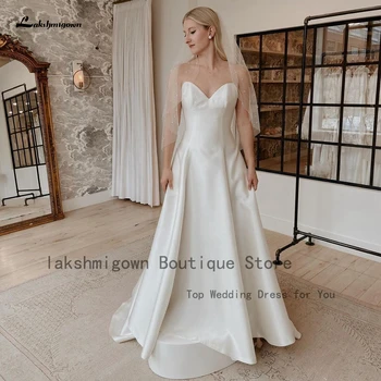 Lakshmigown Просто Атласное Сватбена рокля Трапецовидна форма от сатен 2022 Елегантни Сватбени Дълги Вечерни Рокли с Лък Раменете 1